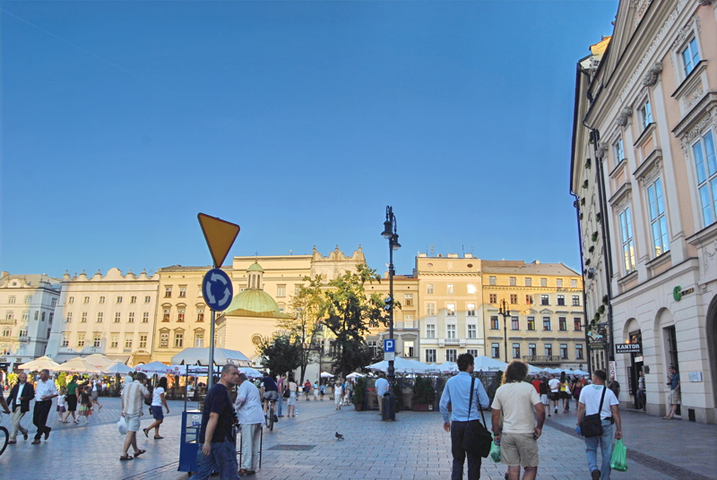 30 - The historic Main Market Square in Kraków, Poland, featuring the small domed Church of St. Adalbert in the background
